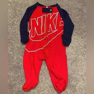 Nike Size Newborn one piece footie zip up with hand covers. Red/navy. Like new!